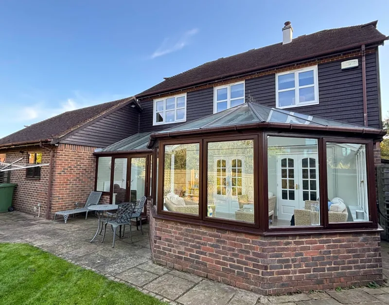 Conservatory and patio at the back of the house